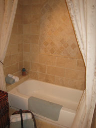 Duluth bathroom remodeling, travertine tails installation